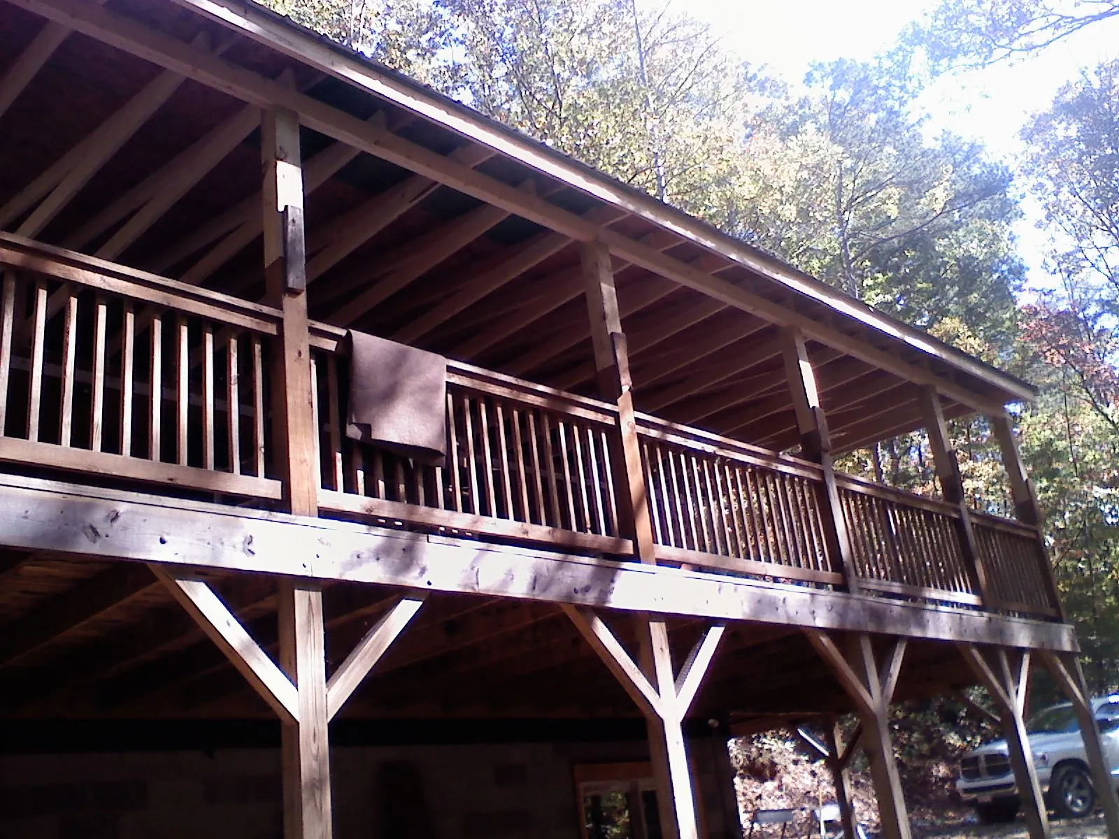 Timber framing under a new elevated porch and deck — Roof Leak Repair in Rialto by Roofing Brothers